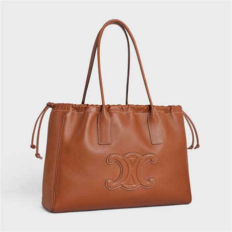 celine small cabas triomphe|Celine Smooth Calfskin Cuir Small Triomphe Cabas Drawstring Tan.